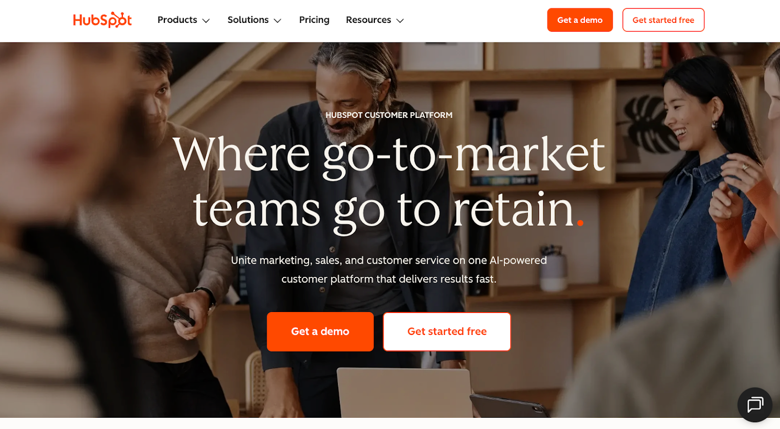 Screenshot of HubSpot's landing page, showing a headline "Where go-to-market teams go to retain