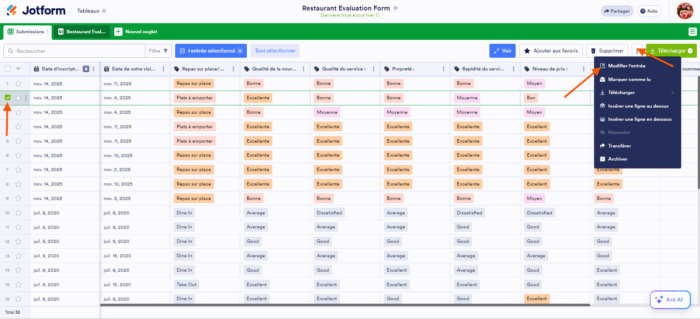 Capture d'écran d'une liste de soumissions dans les Tableaux Jotform avec une soumission sélectionnée, une flèche pointant vers les trois points verticaux en haut à droite et une autre vers Modifier l'entrée dans le menu qui s'est ouvert